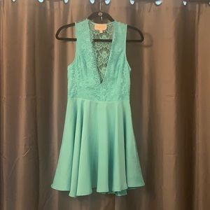 Low cut, backless, teal, lace mini dress